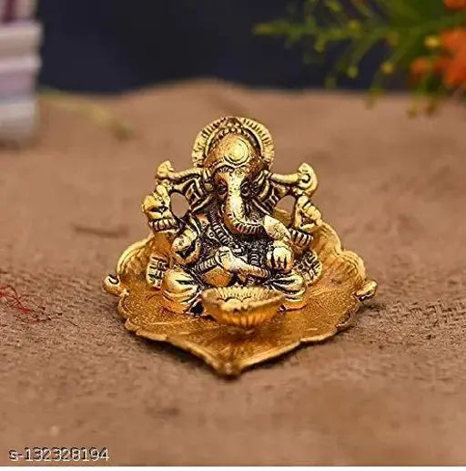 Metal Ganesh ji on Leaf with Diya Idol Showpiece for Home Décor and Diwali Gift