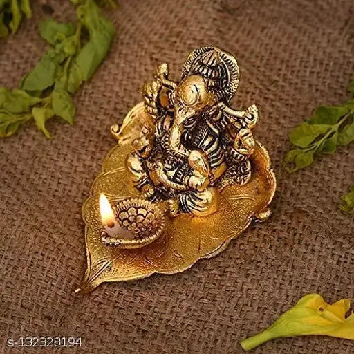 Metal Ganesh ji on Leaf with Diya Idol Showpiece for Home Décor and Diwali Gift